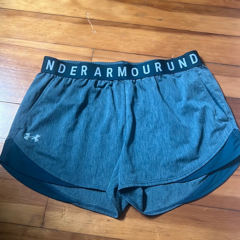 A pair of under armour shorts.